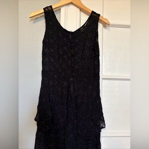 Vintage sheer black lace slip type dress half button and zip.